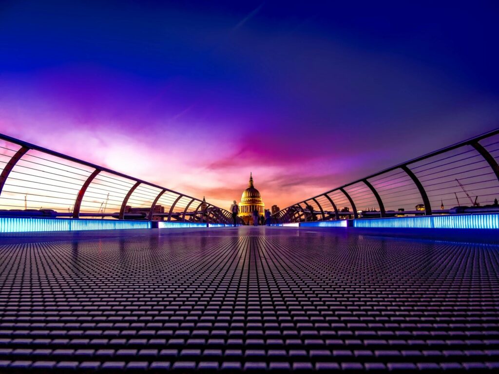 pexels-photo-220769-220769 Captivating view of London's Millennium Bridge at sunset with St. Paul's Cathedral in the background.